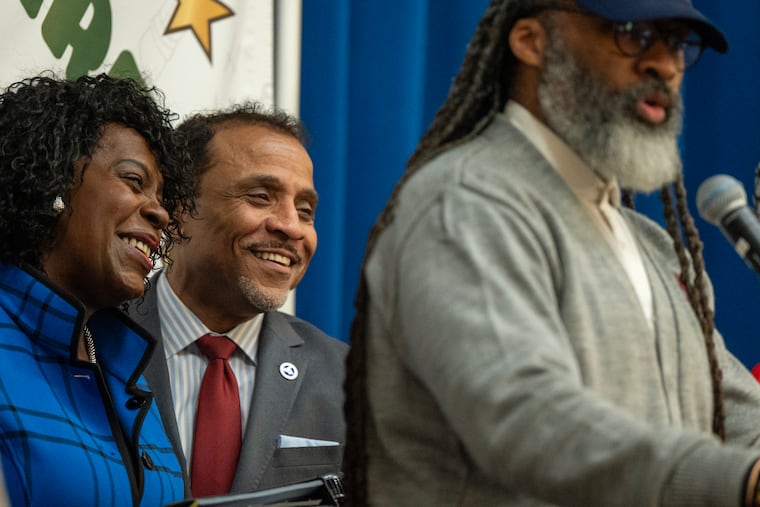 Mayor Cherelle L. Parker is with Superintendent Tony B. Watlington Sr. (center) at McDaniel Elementary School on Monday as Reginald Streater, president of the Board of Education, speaks during announcement of the mayor’s proposed $1-per-ride Uber and Lyft tax to help bail the Philadelphia School District out of a budget deficit.