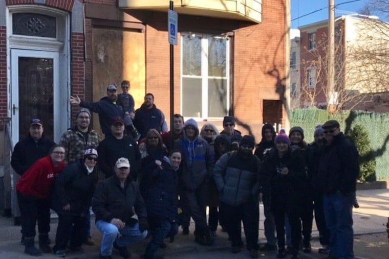 The Klenk family poses in front of their home on Thompson Street in Fishtown. The house collapsed on Sunday, February 10, 2019, after a Philly contractor worked without permits on the house next door.