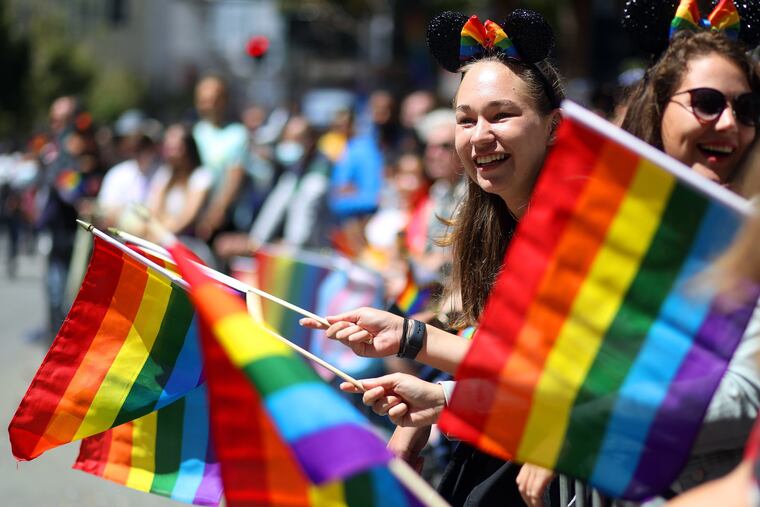 Spectators at San Francisco's Lesbian Gay Bisexual Transgender Pride Parade in June. Hate directed toward LGBTQ people is thriving online.