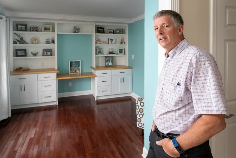 Ernie Leone has become a handyman for his three young adult children. He built custom bookshelves for his daughter at her home in Berlin, N.J.