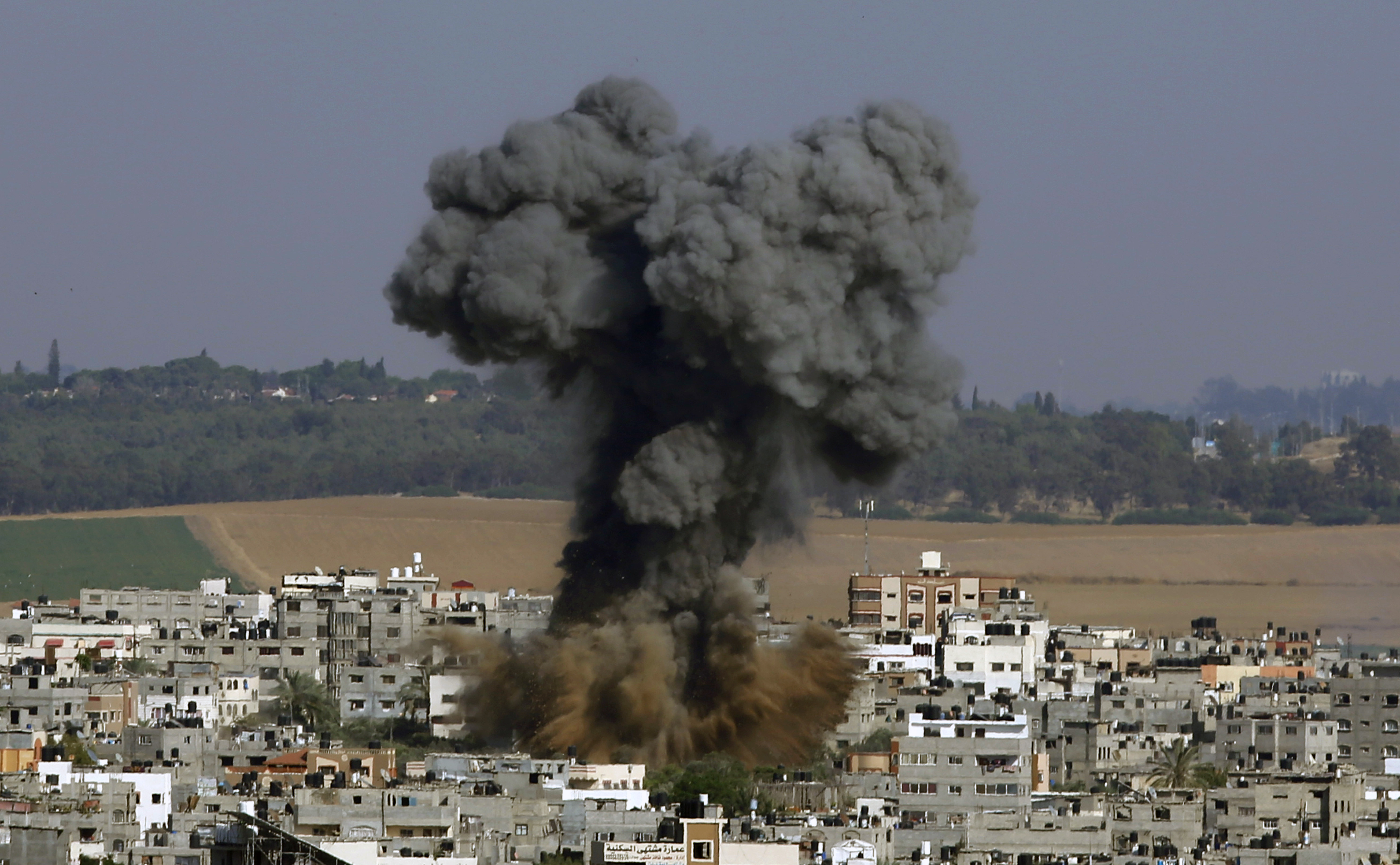 Smoke rises after an Israeli airstrike Tuesday in Gaza City.