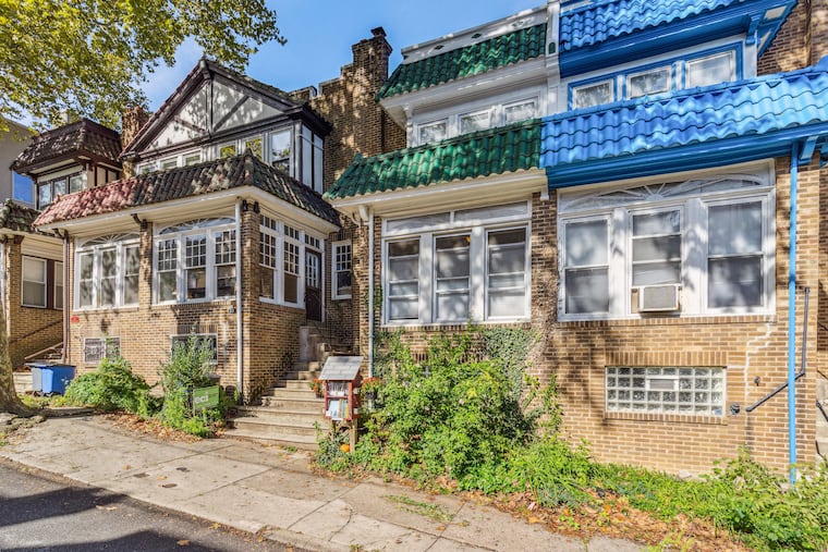 “We survived the pandemic in this house," Kristine Weatheston says of the three-bedroom home, on the right, now for sale.