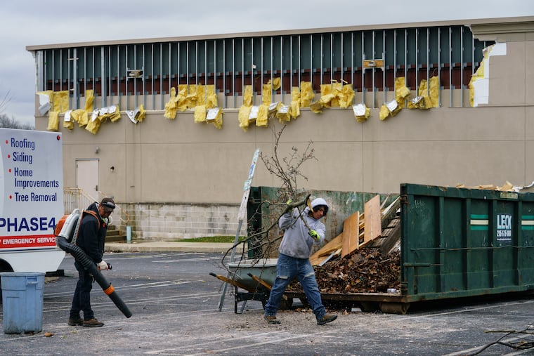 Clean up has begun at the closed Noboru restaurant that was damaged when a tornado hurled trees into it in Montgomeryville, Montgomery County, on Monday.
