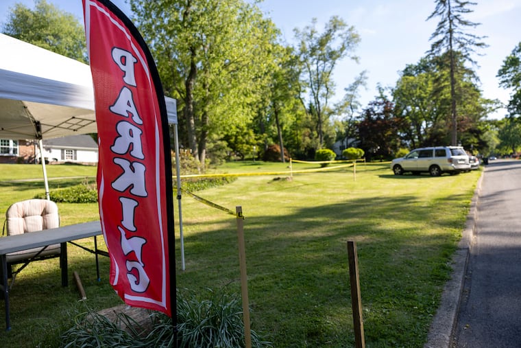 Newtown Square homeowners advertise paid parking spaces on their lawn for folks attending the 2026 PGA Championship.