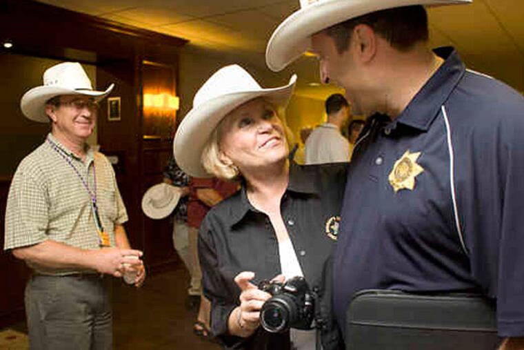 2010 file photo: Chester County Sheriff Carolyn "Bunny Welsh" welcomes Butler County Sheriff Michael Slupe to the 88th annual sheriffs' conference.