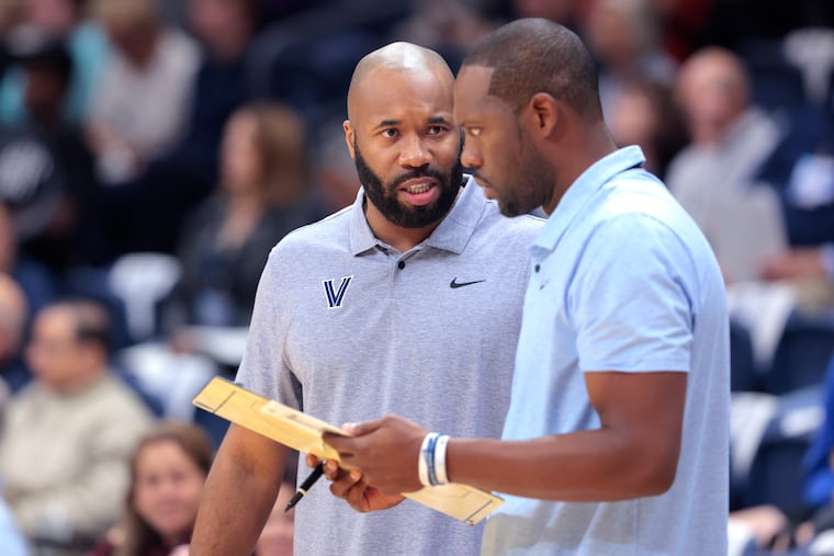 Villanova head coach Kyle Neptune (left) and assistant Dwayne Anderson on the sideline during the Blue/White scrimmage at Finneran Pavilion on Oct. 8.