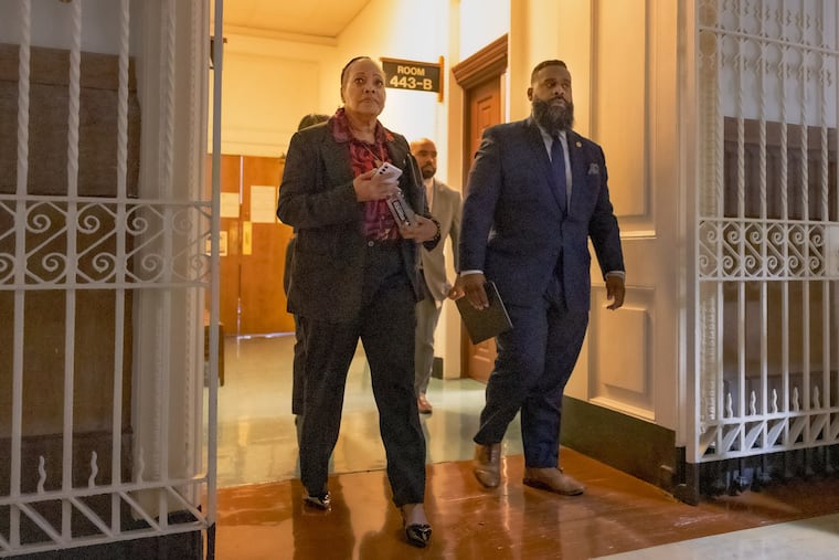 Sheriff Rochelle Bilal, (l) seen exiting the courtroom at City Hall during a break on Wednesday, Aug. 26, 2026, in Philadelphia.