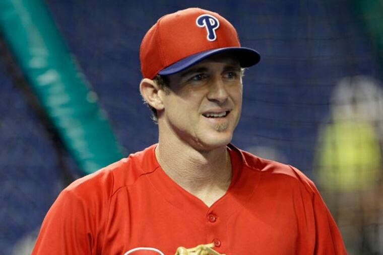 Chase Utley waits for the throw during batting practice before a baseball game against the Miami Marlins in Miami, Monday, May 20, 2013. (Lynne Sladky/AP)