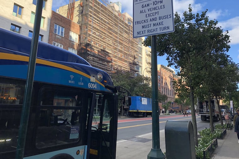 A sign on the new 14th Street transitway warns motorists that through-traffic is not allowed.