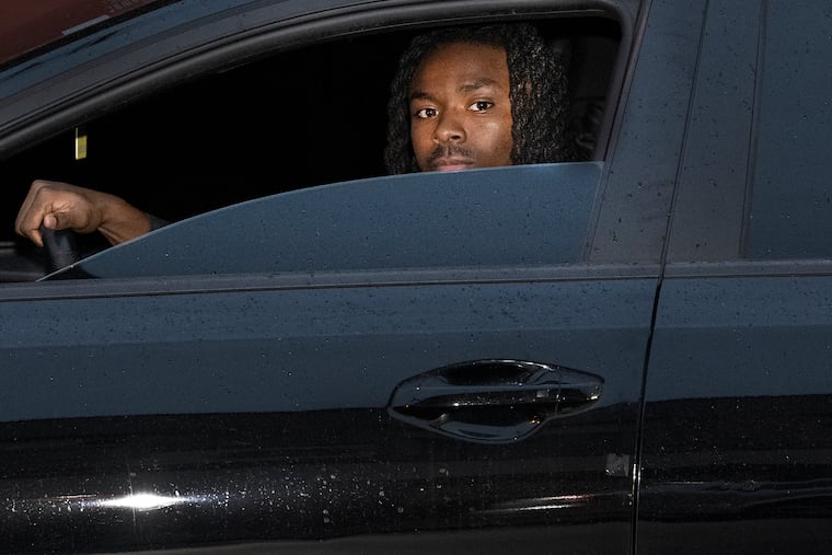 Devon Sistrunk is photographed inside his car near 53rd and Market Streets in Philadelphia on Monday, Oct. 30, 2023. Sistrunk, a teaching assistant at Universal Charter School at Audenried, was dragged out of his car at 53rd and Market Streets on Oct. 14 after being stopped by police because of his tinted car windows.
