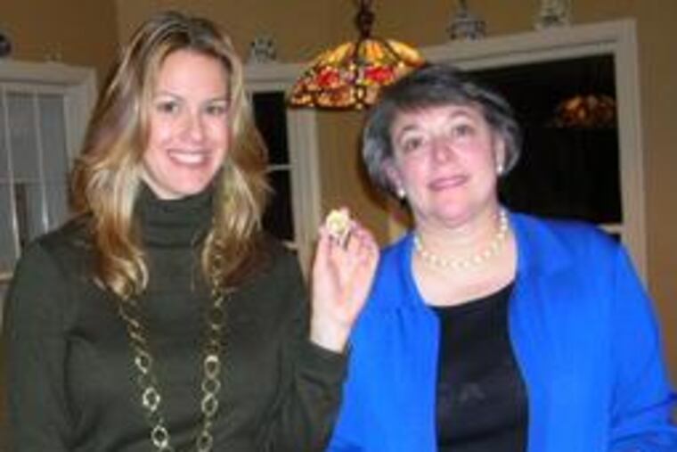 "History Detectives" investigator Elyse Luray (left) looks into claims that a pin belonging to North Carolinian Sandy Fisher is made of metal taken from the Liberty Bell in 1895.
