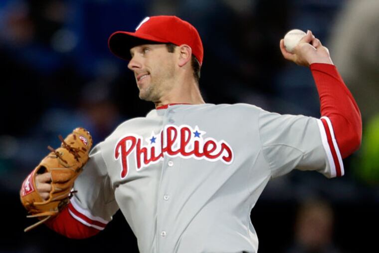 Cliff Lee throws in the first inning of a baseball game against the Atlanta Braves, Thursday, April 4, 2013, in Atlanta. (David Goldman/AP)