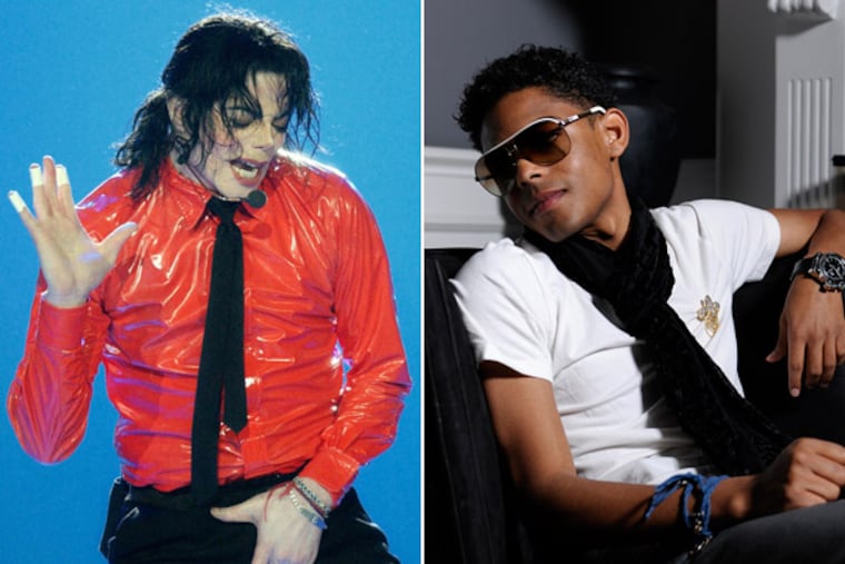 Michael Jackson (L) and supposed son Brandon Howard (R).