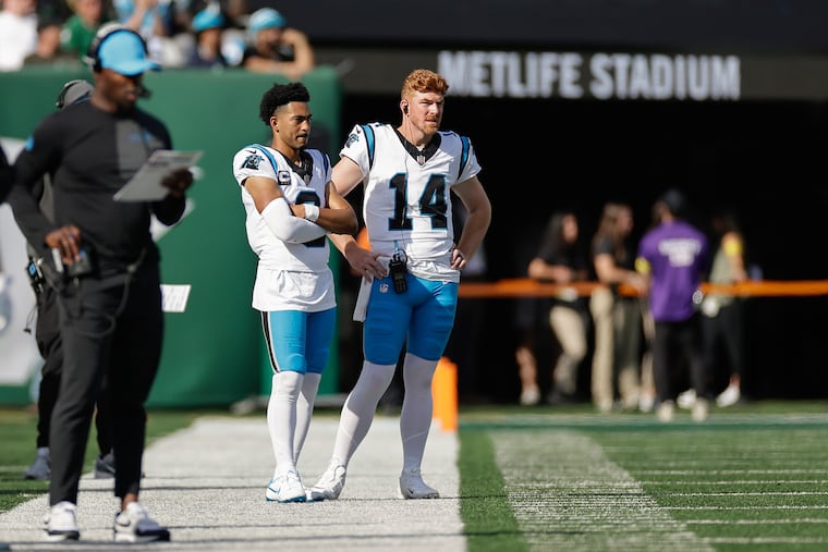 Andy Dalton (14) helped mentor Bryce Young (9) in Carolina, and that relationship might be what the Eagles have in mind for their own ex-Alabama quarterback.