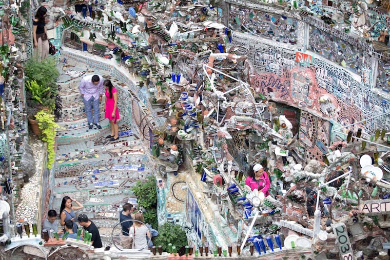 Tourists visit Philadelphia's Magic Gardens, which was built by Isaiah Zagar in the 1960s. Free Library of Philadelphia cardholders can now make free reservations at 11 different cultural attractions throughout the city, including the Magic Gardens