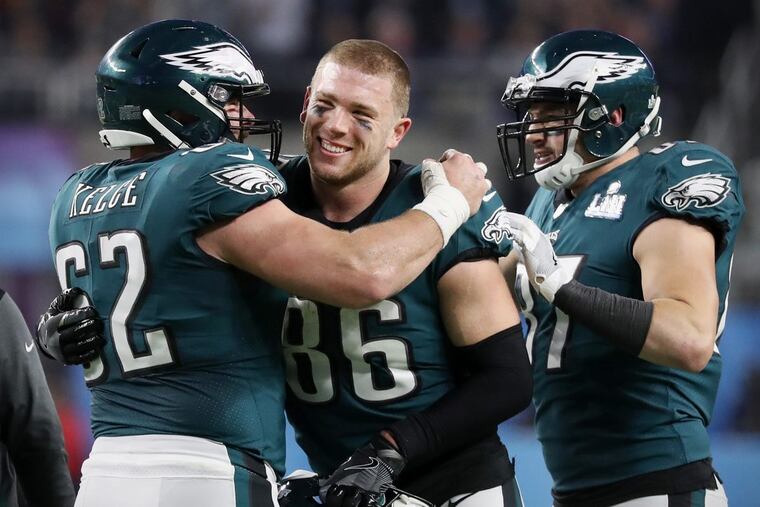 Eagles center Jason Kelce celebrates with Eagles tight end Zach Ertz after Ertz scored the game-winning touchdown in the fourth quarter of Super Bowl LII, at U.S. Bank Stadium in Minneapolis, Minnesota, Sunday, Feb. 4, 2018. The Eagles won 41-33. TIM TAI / Staff Photographer
