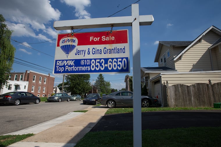 A for sale sign on Ohio Avenue in Ridley Park, Delaware County. The number of home sales in the suburbs was up in the second quarter of the year, while sales in Philadelphia dipped.