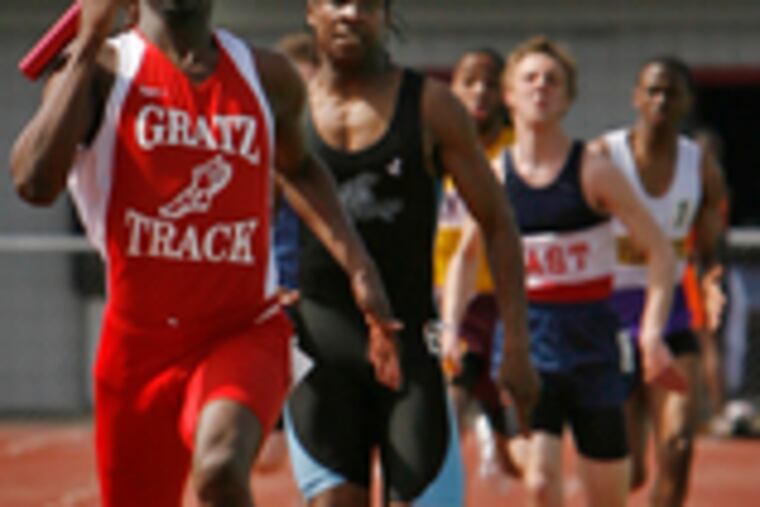 Khaliff Featherstone of Simon Gratz is headed for victory in the Division I 4x200 relay. Featherstone and Gratz also won the 4x100 at the annual TFCA of GP event.