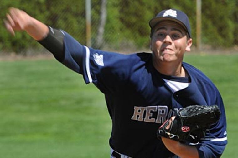 St. Augustine pitcher Matt Rakus throws a pitch against Washington Township. ( April Saul/Inquirer)