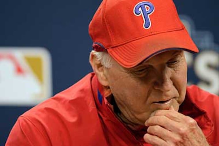 Phillies manager Charlie Manuel addresses the media before the team's workout on Sunday. (David Maialetti / Staff Photographer)