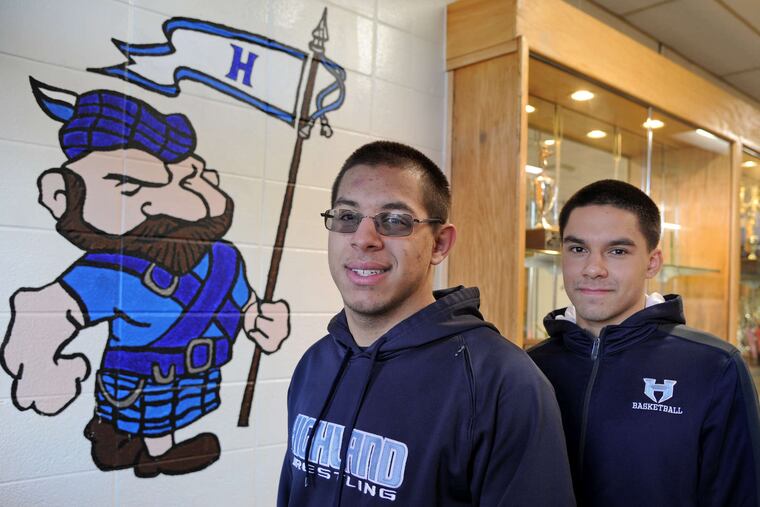 Highland senior Jon Villegas (left) is captain of the Tartans' wrestling team; his brother Gabe is a standout junior point guard on the basketball team. TOM GRALISH / Staff Photographer
