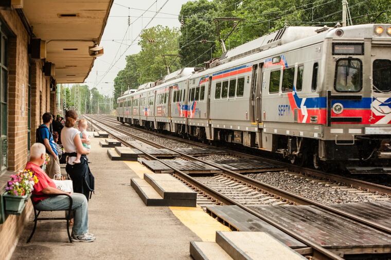 Commuters wait for a regional rail train in Ardmore .
