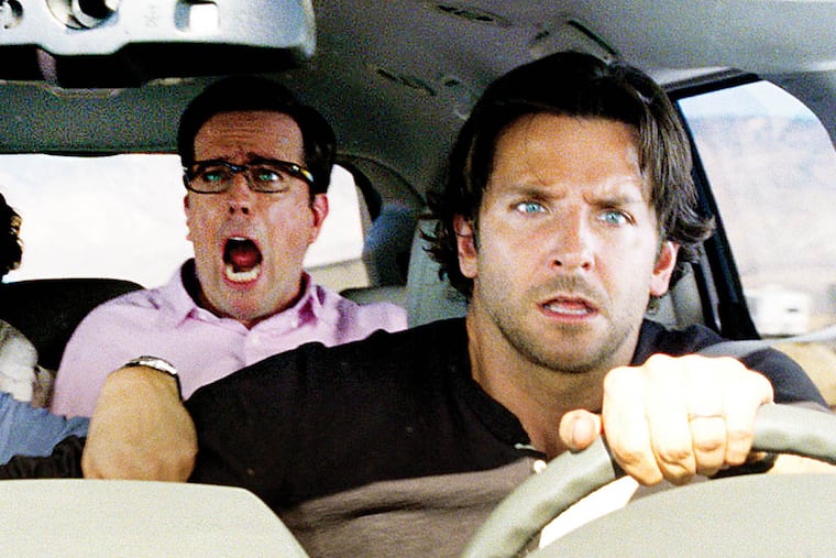 This undated publicity photo released by Warner Bros. Pictures shows, from left, Justin Bartha as Doug, Zach Galfianakis as Alan, Ed Helms as Stu and Bradley Cooper as Phil in “The Hangover Part III.” (AP Photo/Warner Bros. Pictures)