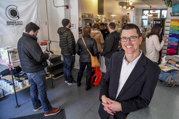 Cory Donovan, program manager for ImpactPHL, visits Quaker City Coffee, one of the city’s businesses committed to enhancing its impact on Philadelphia, partly by employing those who were once incarcerated.