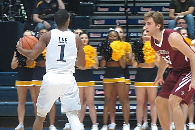 Lafayette’s Paulius Zalys looks to deny an entry pass from Drexel’s Kurk Lee.