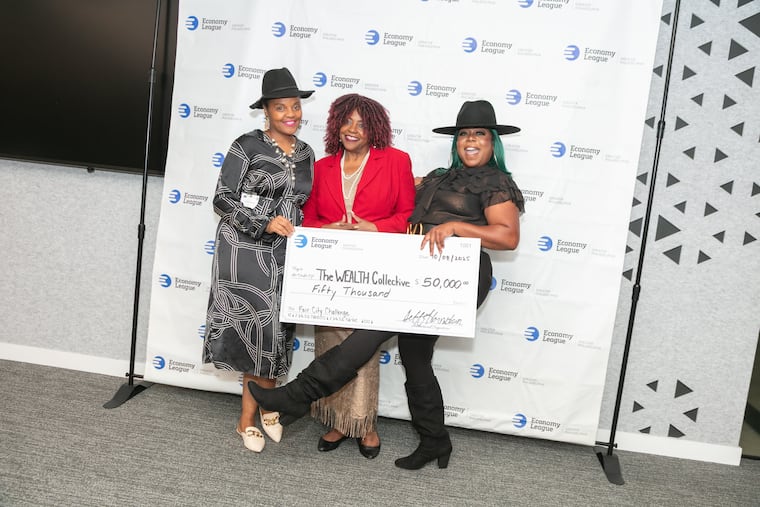 The members of the WEALTH Collective, Vonetta Hawkins, Clara Lyons-DeVaughn, and Almitra Tankersly, pose for a photo after winning the Economy League of Philadelphia's Fair City Challenge competition with their plan to fight home appraisal bias.