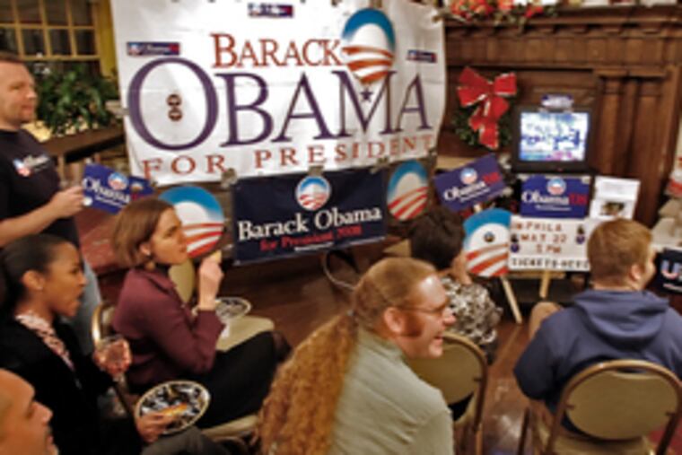"Philadelphia for Obama" supporters gather last night at the Hospital Workers Union Hall on Locust Street to watch the Iowa caucuses.