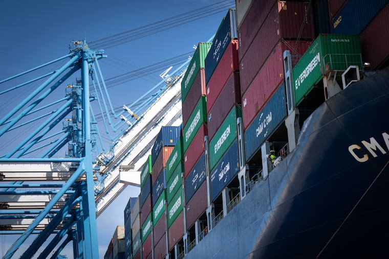 The container ship CMA CGM Marco Polo arrives at Philadelphia's Packer Avenue Marine Terminal in March. Acquiring 150 acres from Norfolk Southern would significantly expand the port’s capacity to handle automobiles and containers.