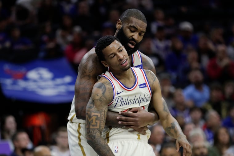Sixers center Kyle O'Quinn (left) and teammate guard Trey Burke are not with the team.