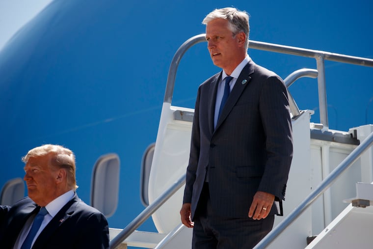 President Donald Trump and new national security adviser Robert O'Brien arrive at Marine Corps Air Station Miramar to attend a fundraiser and visit a section of the border wall, Wednesday, Sept. 18, 2019, in San Diego. (AP Photo/Evan Vucci)