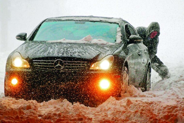 A Mercedes- Benz with rear- wheel drive wasn't dashing through the snow during a storm in Baltimore. KARL MERTON FERRON / Baltimore Sun