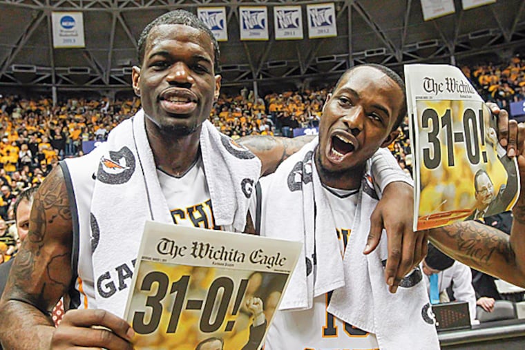 Wichita State's Chadrack Lufile and Nick Wiggins. (Fernando Salazar/The Wichita Eagle/AP)