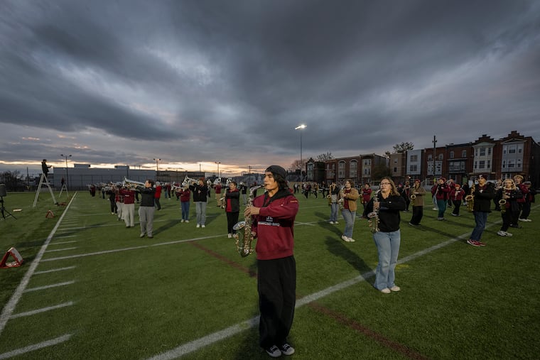 Members of the Temple University Diamond Marching Band rehearse on Thursday, Nov. 13. They will perform in the Macy's Thanksgiving Day parade.