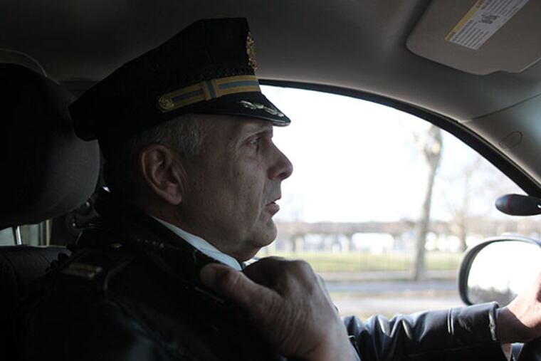 First Police District Captain Lou Campione patrols the streets of South Philadelphia on Thursday, December 26, 2013. ( Yong Kim / Staff Photographer )