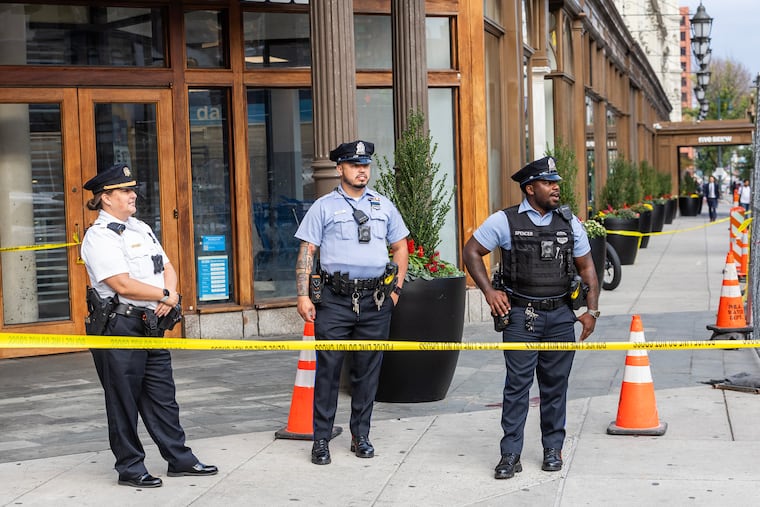 Police at Eighth and Market Streets near the scene of a shooting in Center City on Oct. 4 2024.