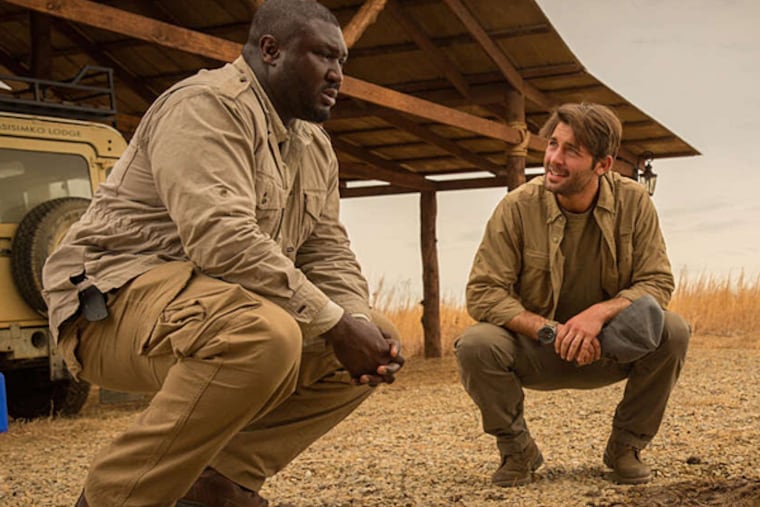 Animals are attacking people, and Nonso Anozie (left) and James Wolk are racing to find out why in the new series "Zoo." (HILARY BRONWYN GAYLE / CBS)