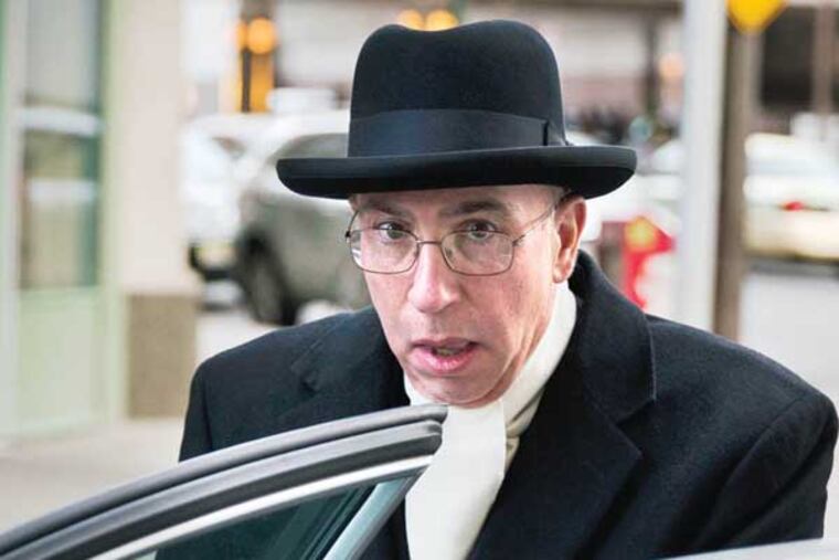 The Rev. Andrew McCormick gets into a car outside the center for criminal justice Thursday, March 6, 2014, in Philadelphia. The Roman Catholic priest accused of molesting an altar boy briefly took the stand Wednesday to deny the 1997 encounter, but acknowledged being reprimanded twice for having children in his private living quarters. (AP Photo/Matt Rourke)