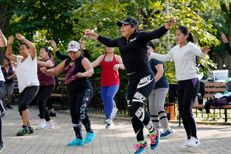 Penn researchers are launching a clinical trial involving 18,000 participants to see if a game approach to promoting physical activity can decrease risk of heart events. This 2020 photo shows people exercising in New York City.