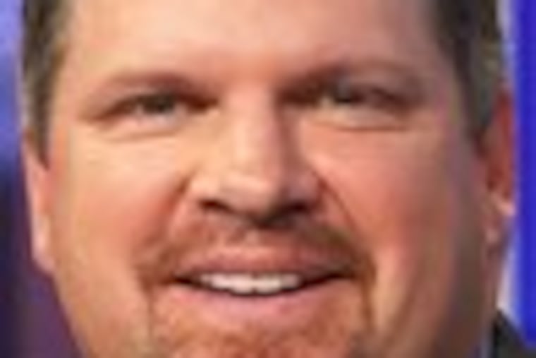 Former Phillie John Kruk works on "Baseball Tonight."