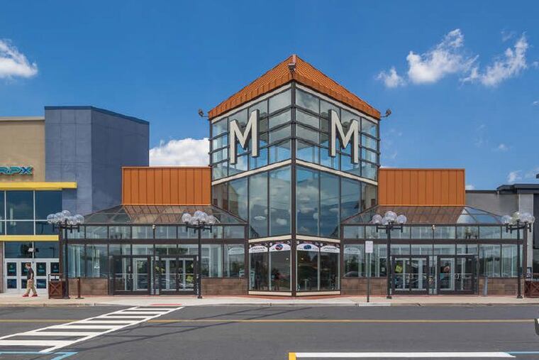 Image of a remodeled entrance of the Moorestown Mall, which has undergone numerous renovations and expansions – and been through many ups and downs – since it opened in 1963. Several new tenants, including a Sierra Trading Post, have been announced or are expected to open in the space left behind by the 2017 closure of Macy’s.