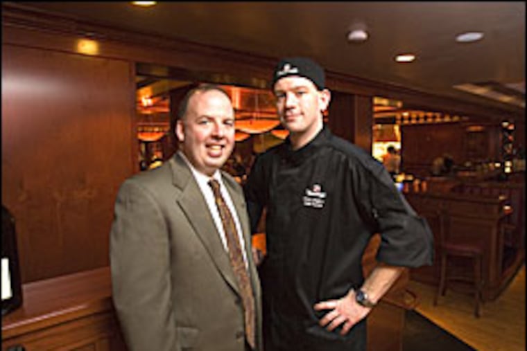 Patrick English, left, operating partner, and Davis Landhorne, chief partner, of Fleming's Prime Steakhouse & Wine Bar in Radnor.