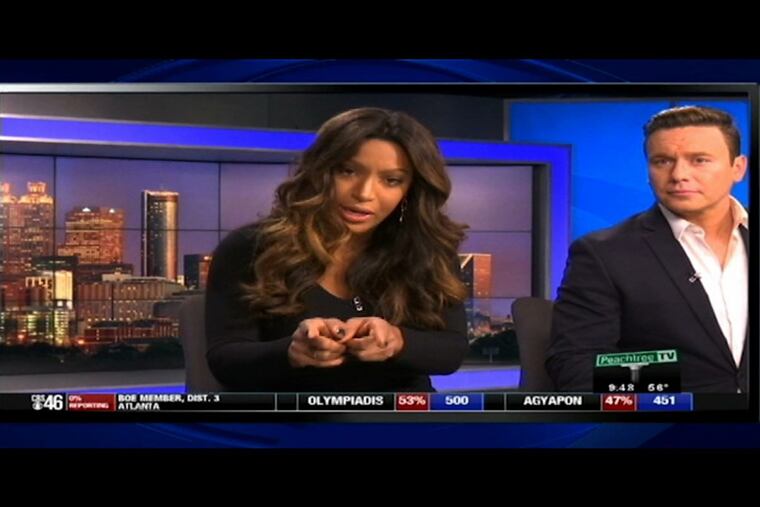 In this frame made from video, an Atlanta news anchor responds on Tue., Dec. 5, 2017, to a viewer who called her a racial slur in an email. Sharon Reed, an anchor for WGCL-TV, read the email on air Tuesday night and posted it on Facebook. The viewer says Reed should be fired for a "race baiting comment" and says: "It's o.k. for blacks to discuss certain subjects but not whites, really???" The viewer then calls Reed the N-word.