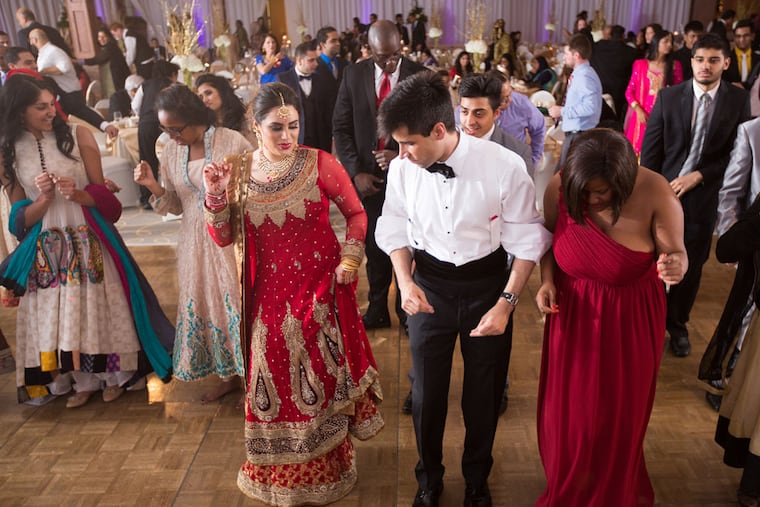 Fatima Baig and Tarik Khan at their reception. (Adam and Emily Photography, Bay City, Mich.)