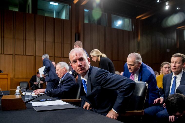 Boeing Company President and Chief Executive Officer Dennis Muilenburg leaves after testifying before a Senate Committee on Commerce, Science, and Transportation hearing on 'Aviation Safety and the Future of Boeing's 737 MAX' on Capitol Hill in Washington, Tuesday, Oct. 29, 2019. (AP Photo/Andrew Harnik)