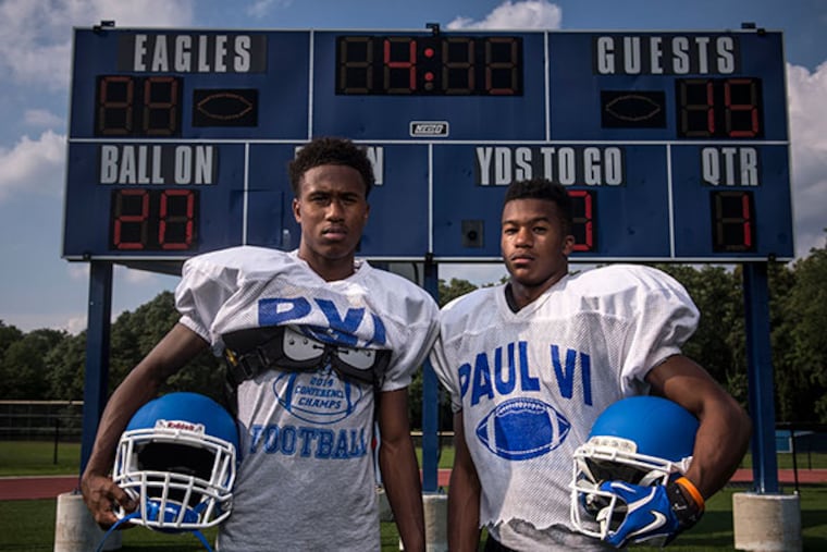Paul VI high school senior scatbacks Lonnie Moore (left) and Stefone Moore-Green, during a pre-season practice at Paul VI High School in Haddonfield, New Jersey, August 24, 2015.