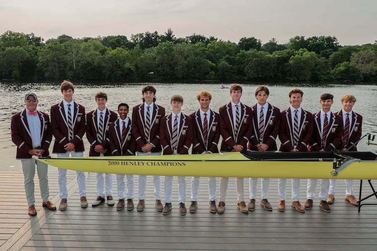 The St. Joseph’s Prep varsity eight plus coxswain will compete Tuesday in the Henley Royal Regatta. From left are coach John Fife, senior captain Owen Finnerty, Luke Helstrom, junior coxswain Luke Joseph, Owen McKenna, Braeden Montgomery, Gio Santaniello, senior captain Luke Smith, Philip Watson, Maximus Wilson, alternate Niko Haralambous, and alternate R.J. Pelton.
